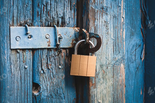 Preview: old door locked with new padlock