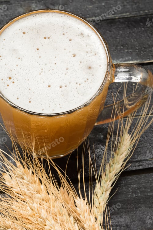 Preview: beer glass on a wooden background