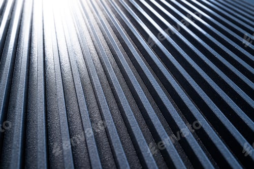 Preview: Close-up of a golden corrugated metal surface
