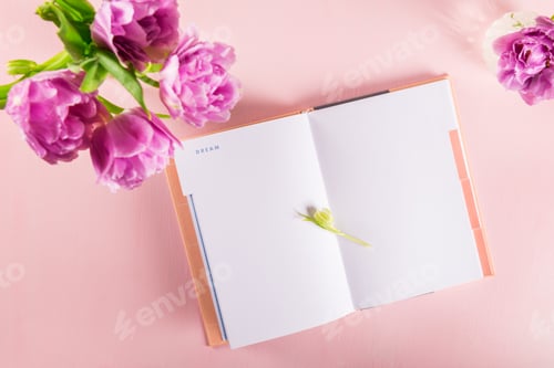 Preview: Open Notebook for writing Dreams and Ideas with flowers nearby