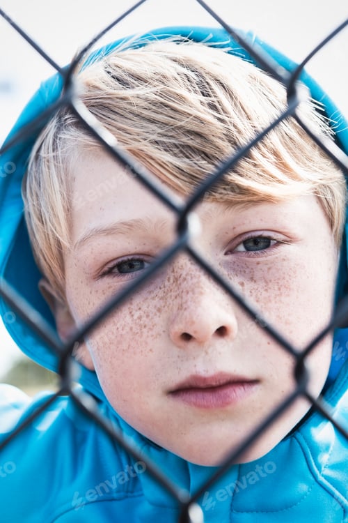 Preview: Boy Behind Fence