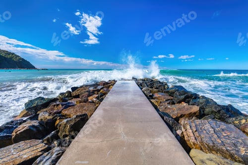 Preview: Waves crash on rocky jetty
