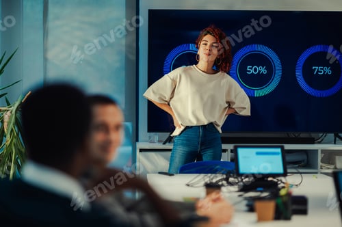 Preview: Portrait of a latino hispanic woman team leader presenting project on a meeting