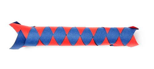 Preview: Chinese finger trap isolated on white, top view