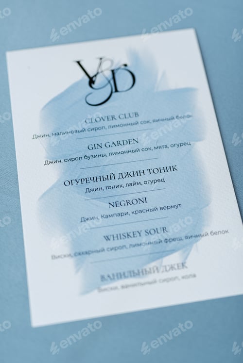 Preview: wedding invitation in a gray envelope on a table