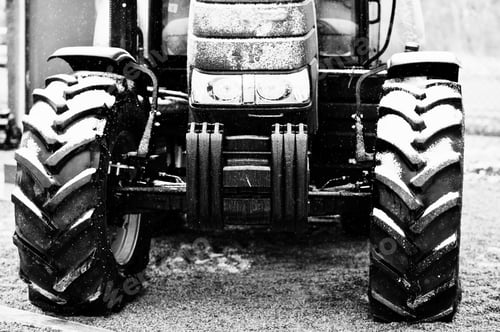 Preview: Wheels of new tractor in snowy weather