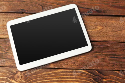 Preview: digital tablet on wooden table