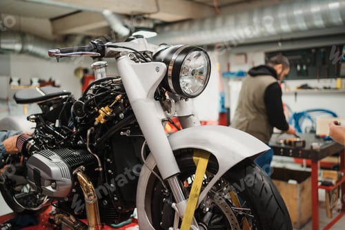 Preview: Custom motorcycle standing in repair shop