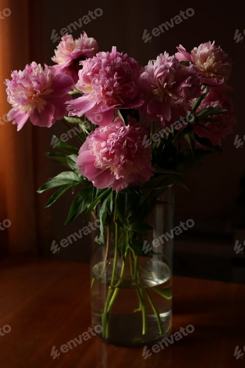 Preview: Pink Flowers in a Glass Vase on Table