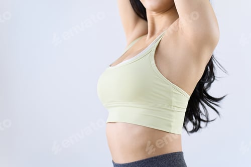 Preview: Tight female breasts doing training