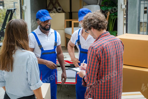 Preview: House moving service,Homeowner checking delivery list cardboard.