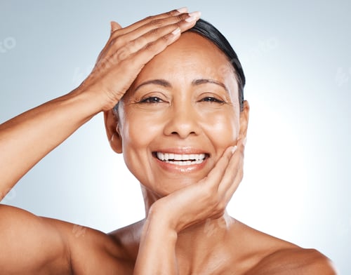 Preview: Face, senior woman and happy in portrait with healthy skin and antiaging skincare isolated on gradi