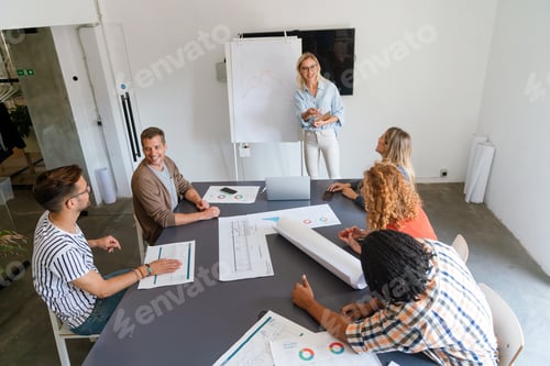 Preview: Collaborative process of multicultural skilled people during brainstorming meeting in office