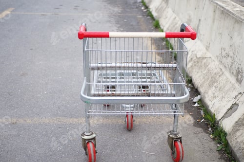 Preview: Shopping cart in a empty car park