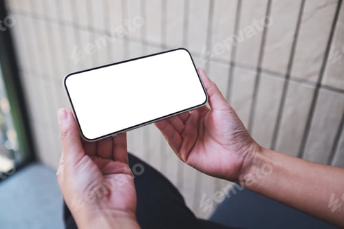 Preview: Mockup image of a woman holding and using mobile phone with blank desktop screen