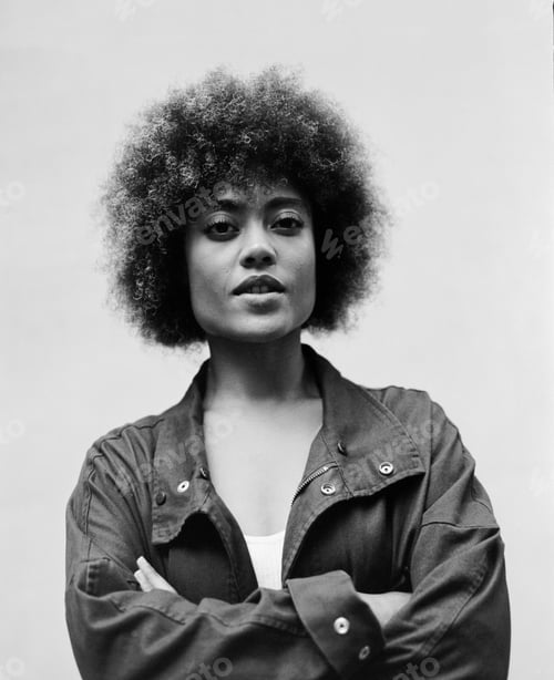 Preview: Powerful image of confident young woman on white background.