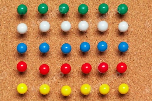Preview: Group of thumbtacks pinned on corkboard in rows