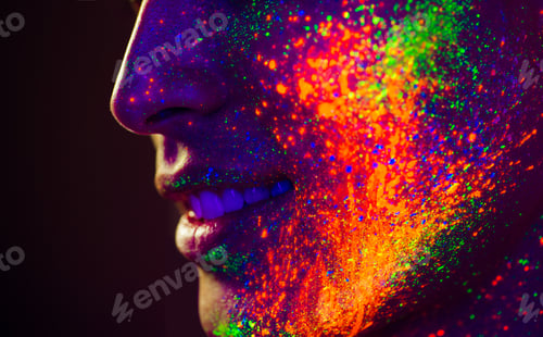 Preview: Fashion model with fluo painting on the face