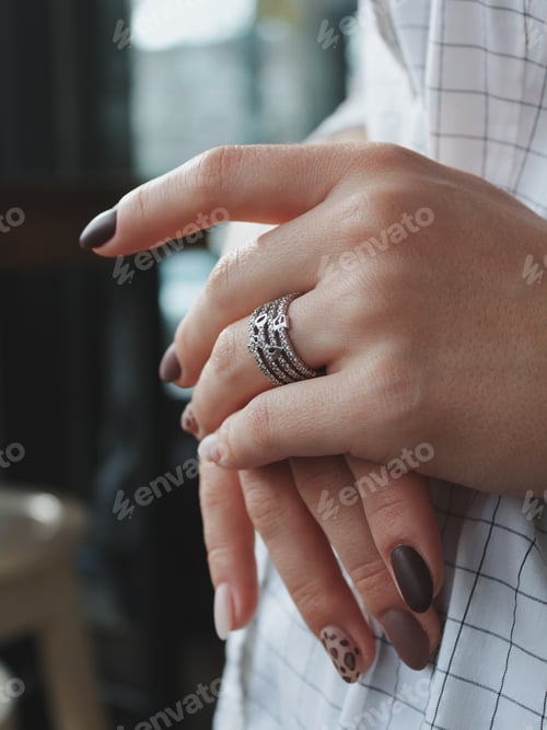 Preview: Closeup shot of a female wearing a beautiful silver ring