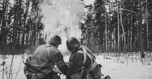 Preview: Mortar Shooting Explosions. Back View On Re-enactors Dressed As American Infantry Soldiers Fire From