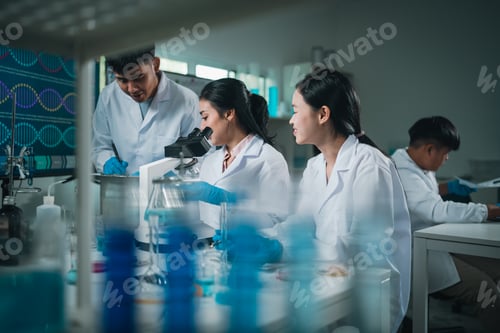 Preview: A team of scientific and medical professionals collaborate in a modern laboratory