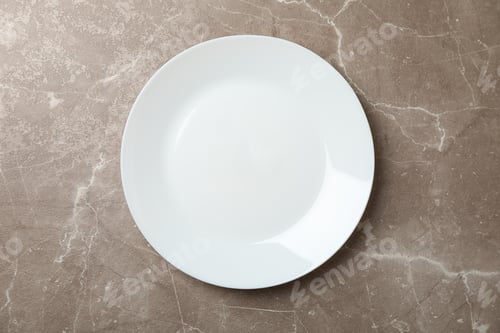 Preview: Plate on grey background, top view and space for text