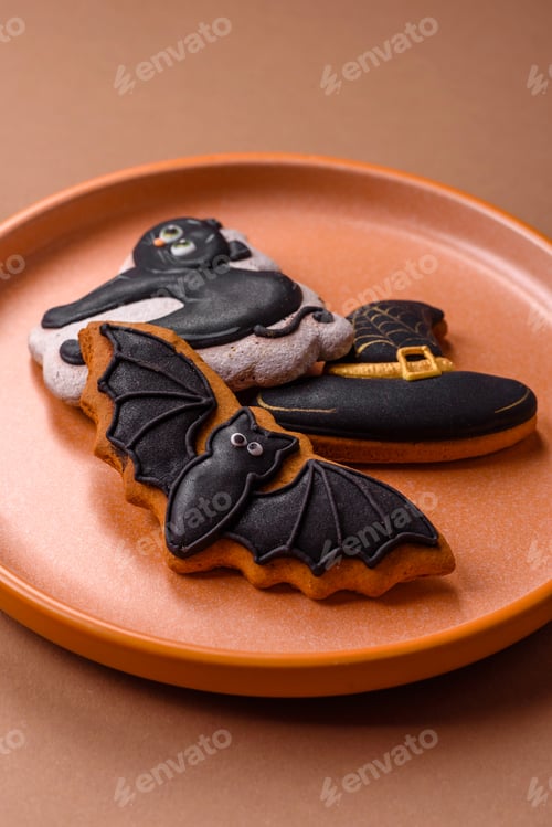Preview: Halloween cookies, sweets, or gingerbread, a cat, a bat, and a hat. Halloween gingerbread