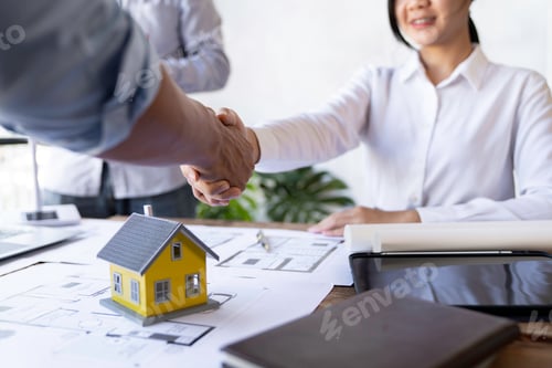 Preview: Architect shakes hands at meeting, meeting of two engineers or architects, shaking hands after discu