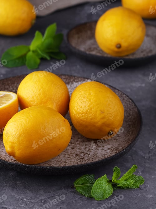 Preview: organic fresh citrus lemons on the table