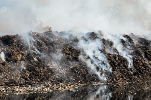 Preview: Landfill with burning trash piles