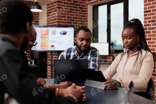 Preview: African american people brainstorming ideas in meeting