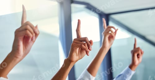 Preview: Cropped shot of four unrecognizable businesspeople sitting with their hands raised in the office