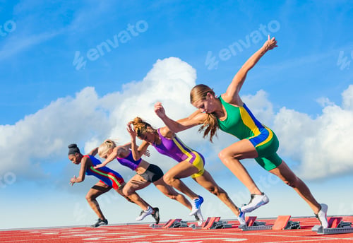 Preview: Four female athletes on athletics track, starting race