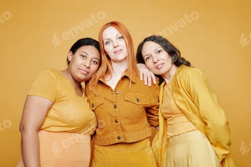 Preview: Multi-ethnic female friends in yellow