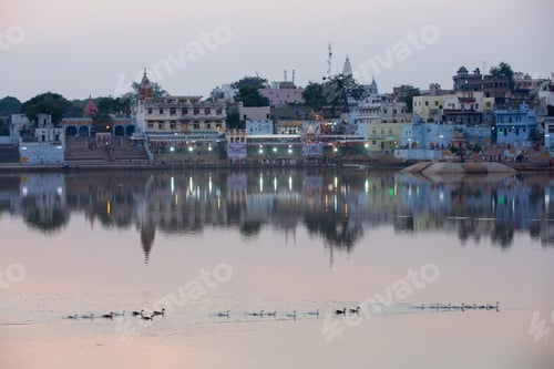Preview: View of waterfront buildings on Pushkar Lake at dusk, Rajasthan, India
