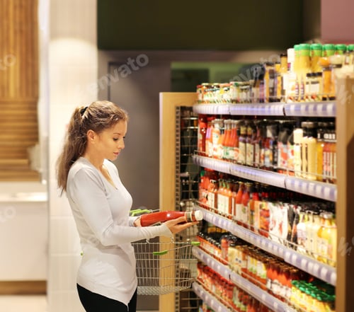 Preview: Woman Choosing A Dairy Products At Supermarket
