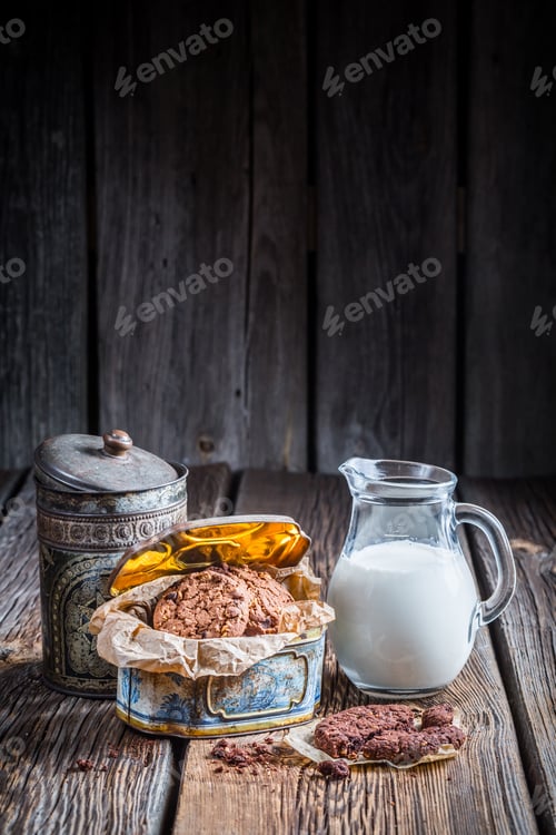 Preview: Milk and hazelnut cookies for breakfast on old wooden table