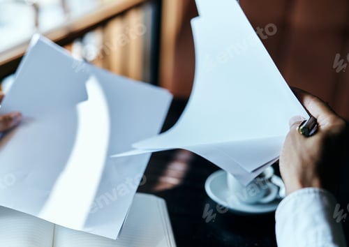 Preview: businesswoman in a cafe with a book on the table documents a cup of coffee work lifestyle