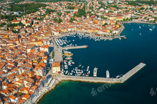 Preview: Town of Rovinj with red rooftops of buildings near marina