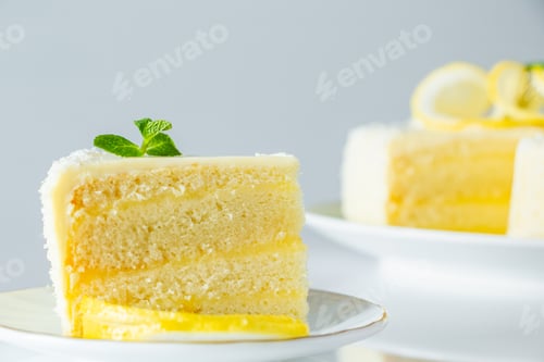 Preview: Lemon cake with coconut flakes. Piece of delicate vanilla dessert with cream.