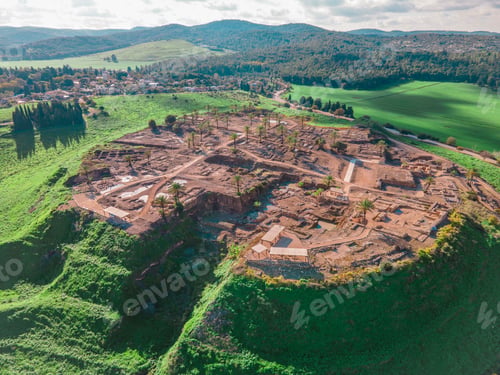 Preview: Aerial view of Tel Megiddo, the ancient Armageddon site, surrounded by lush green landscapes