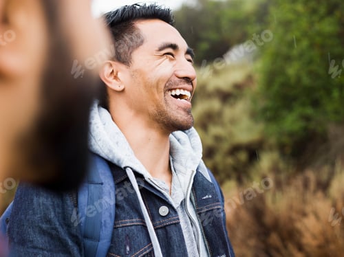 Preview: Two men, one laughing with his head back.