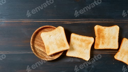 Preview: toasted bread slices on rustic wooden table