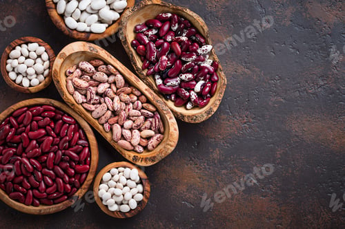 Preview: Assortment of various beans in wooden bowls