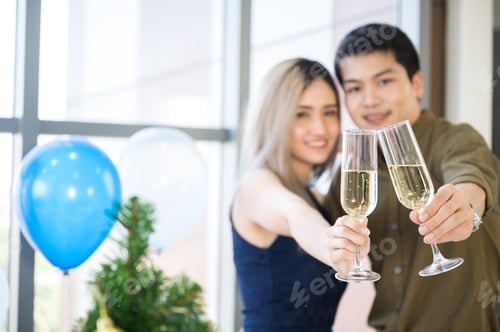 Preview: Closeup of hands of handsome man with beautiful woman celebrating and enjoying occasion