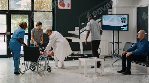 Preview: Father carrying unconscious kid in facility lobby to receive help