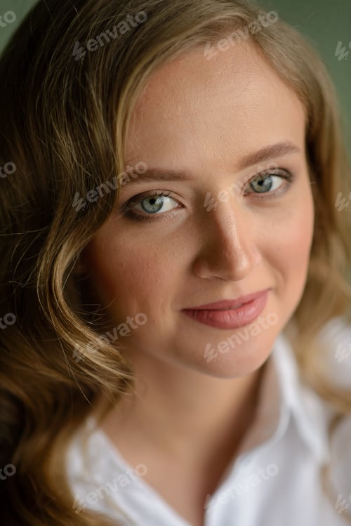Preview: Close-up of an attractive young woman with wavy hair