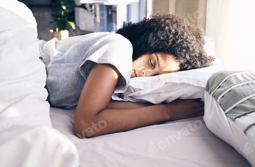 Preview: Sleep, bedroom and relax with a black woman in bed, dreaming or resting in the morning at home. Sle