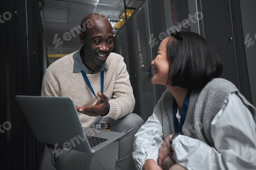 Preview: Laptop, server room or technician people for teamwork, problem solving or database management syste