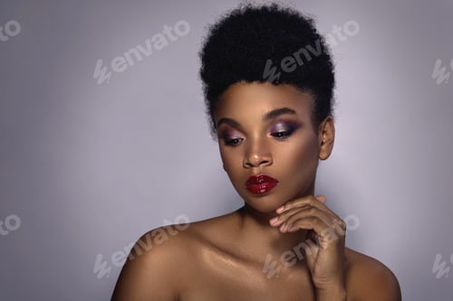 Preview: Young African model with a beautiful makeup